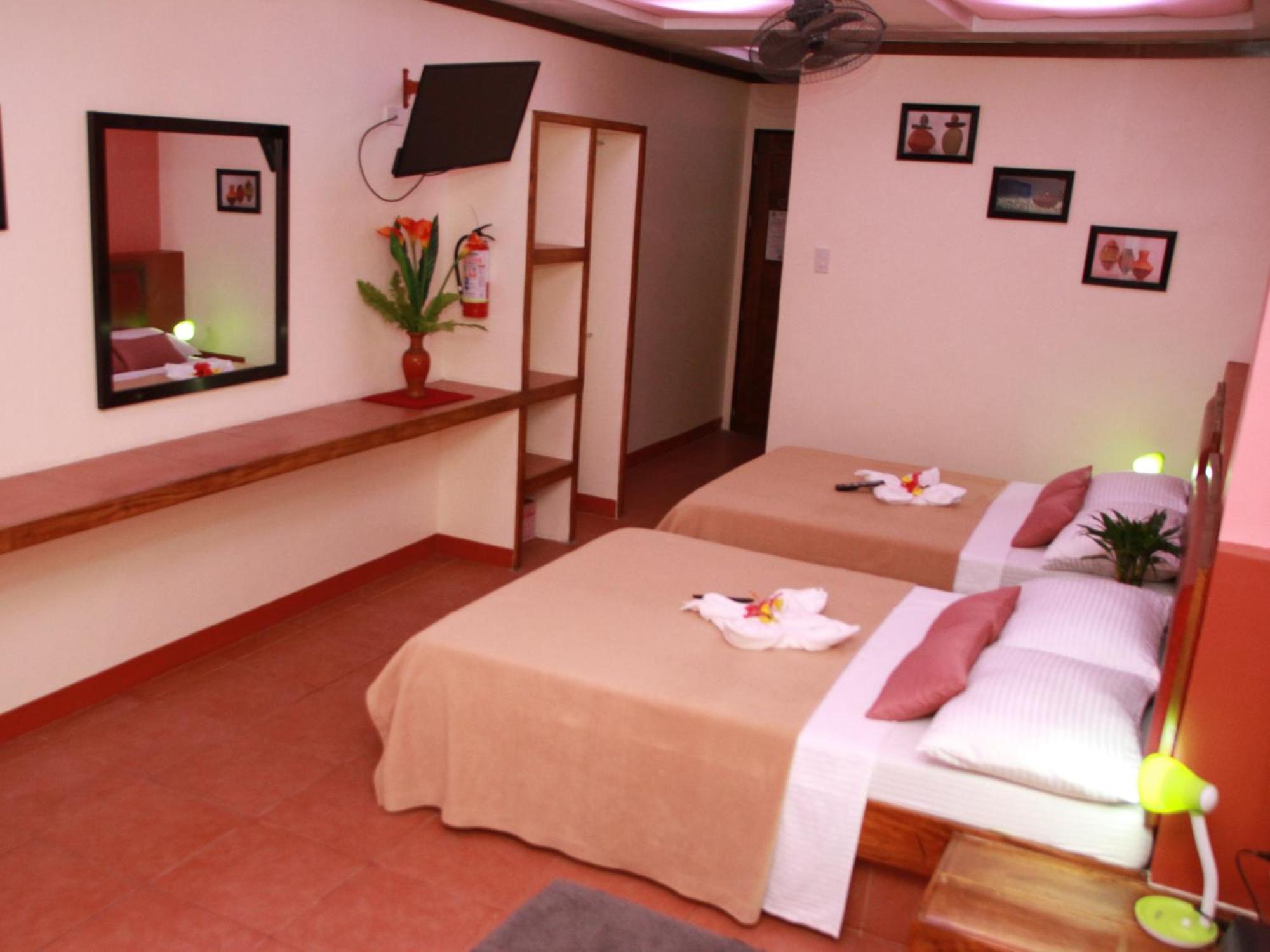 บัดลาดซ์ บีช แอนด์ ไดฟ์ รีสอร์ต Hotel ปูแอร์โตกาเลรา ห้อง รูปภาพ