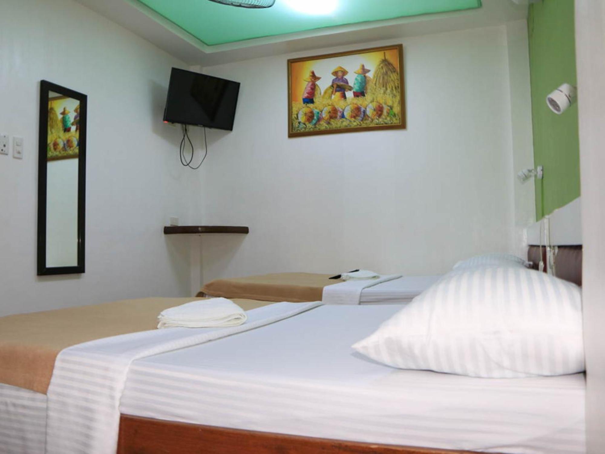 บัดลาดซ์ บีช แอนด์ ไดฟ์ รีสอร์ต Hotel ปูแอร์โตกาเลรา ห้อง รูปภาพ