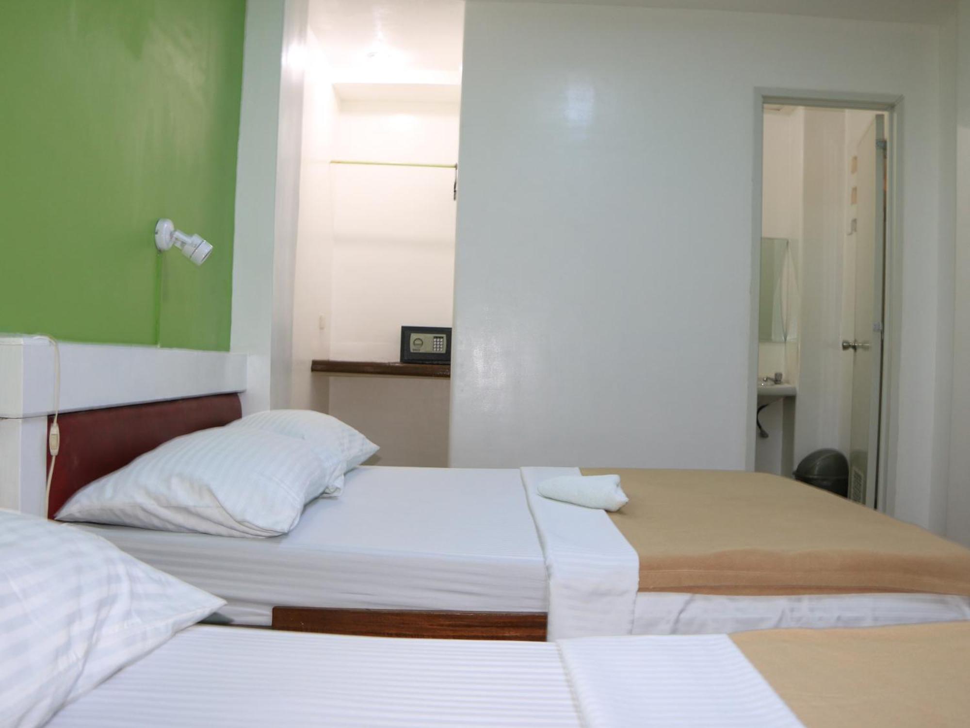 บัดลาดซ์ บีช แอนด์ ไดฟ์ รีสอร์ต Hotel ปูแอร์โตกาเลรา ห้อง รูปภาพ