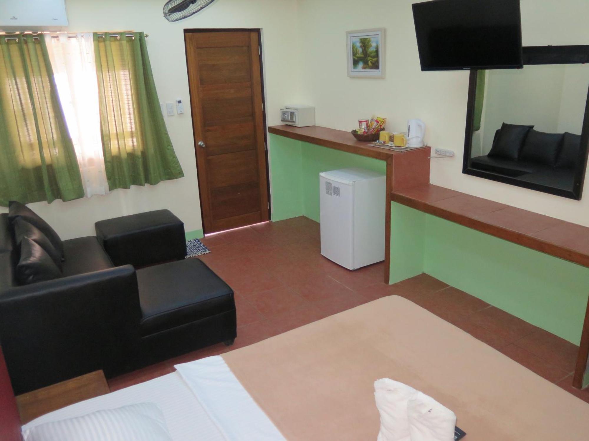 บัดลาดซ์ บีช แอนด์ ไดฟ์ รีสอร์ต Hotel ปูแอร์โตกาเลรา ห้อง รูปภาพ